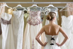 girl-looking-at-wedding-dresses-main