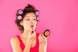 bigstock-Makeup-Woman-Putting-Lipstick-31366397-620x413